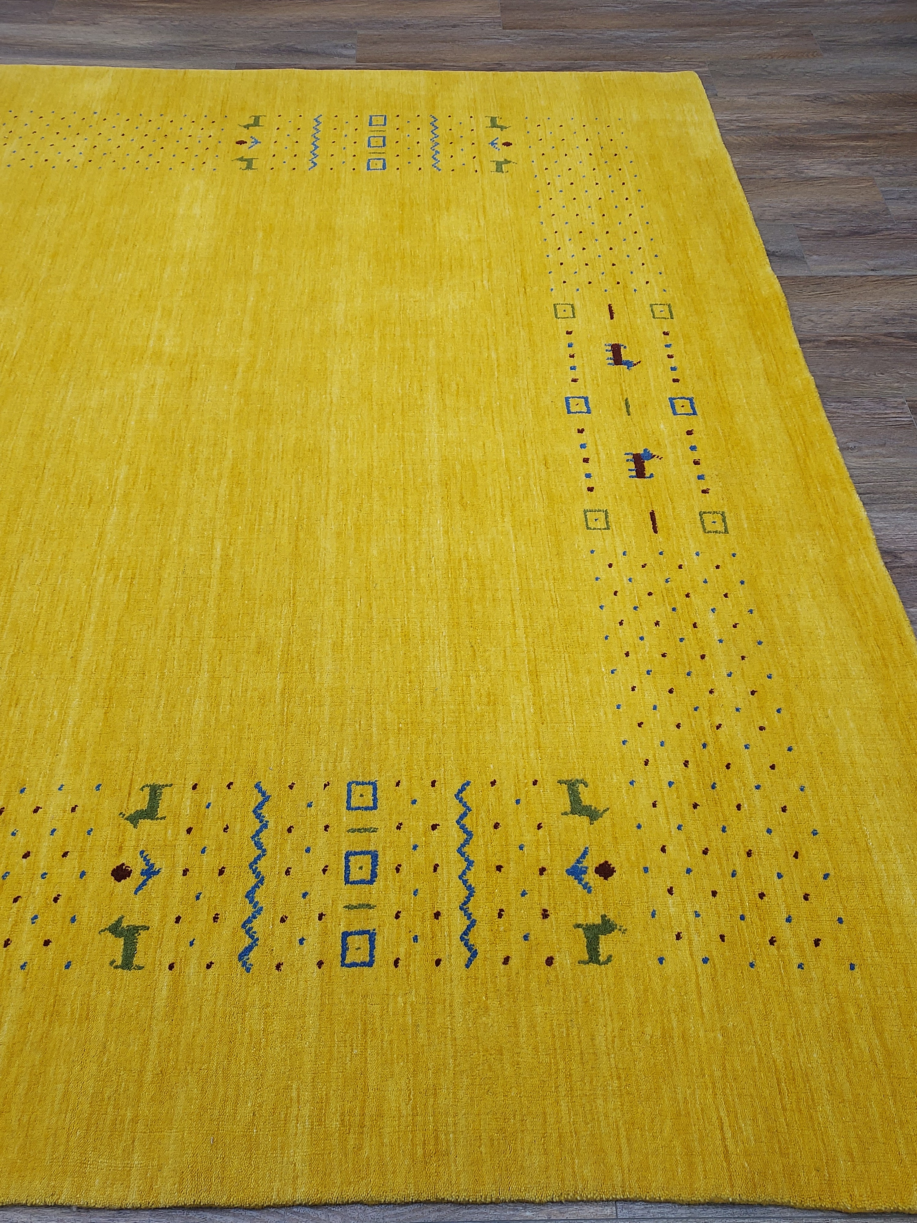 Mustard Yellow Modern Minimalist Rug with Subtle Tribal Accents