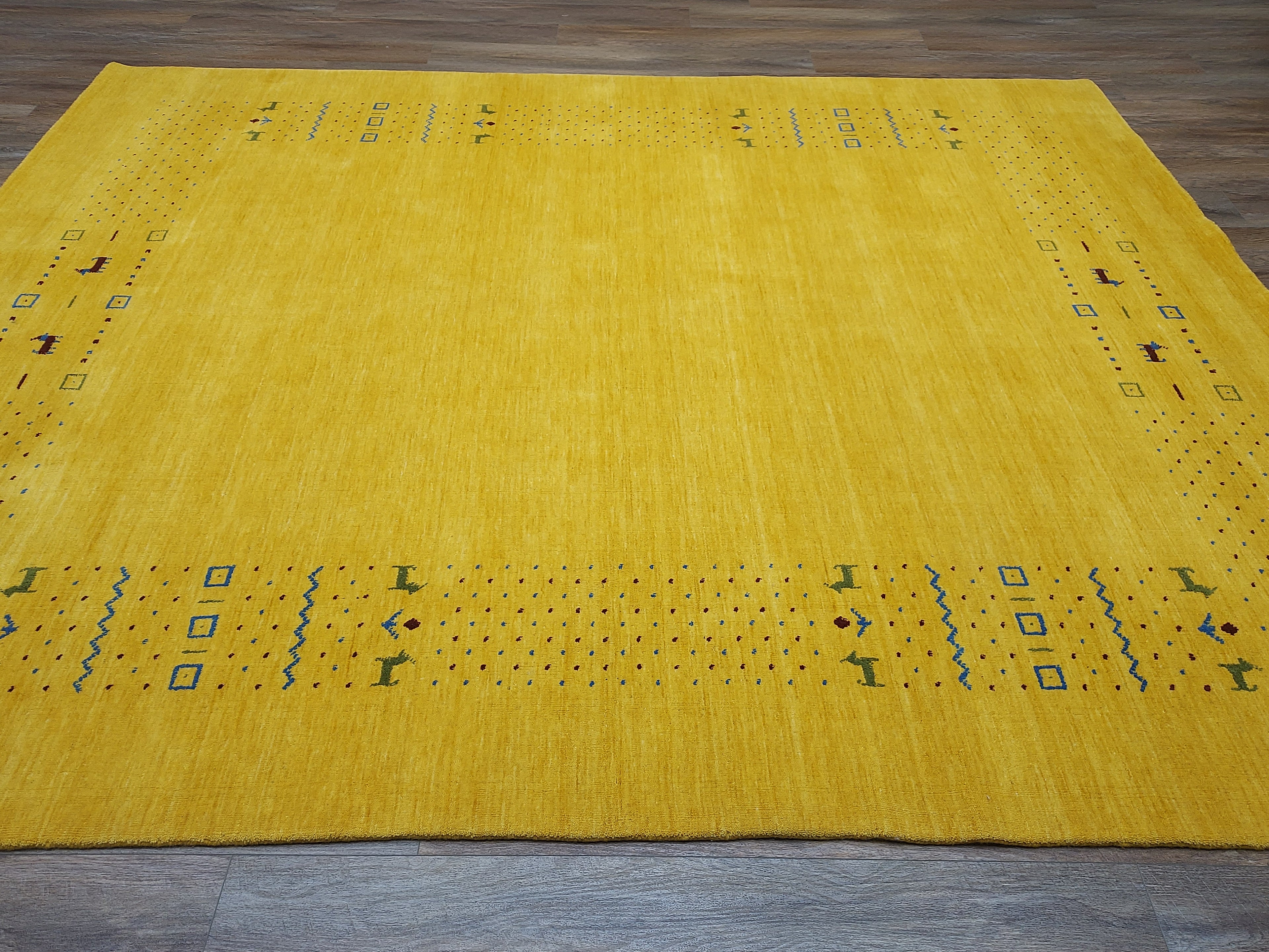Mustard Yellow Modern Minimalist Rug with Subtle Tribal Accents